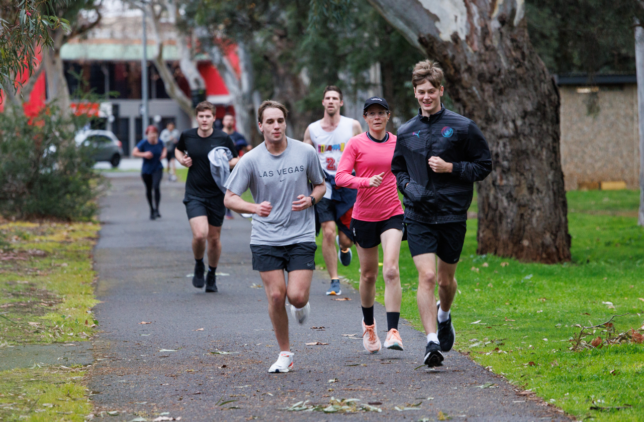 A diverse group of Nexia employees participating in a work run event for charity